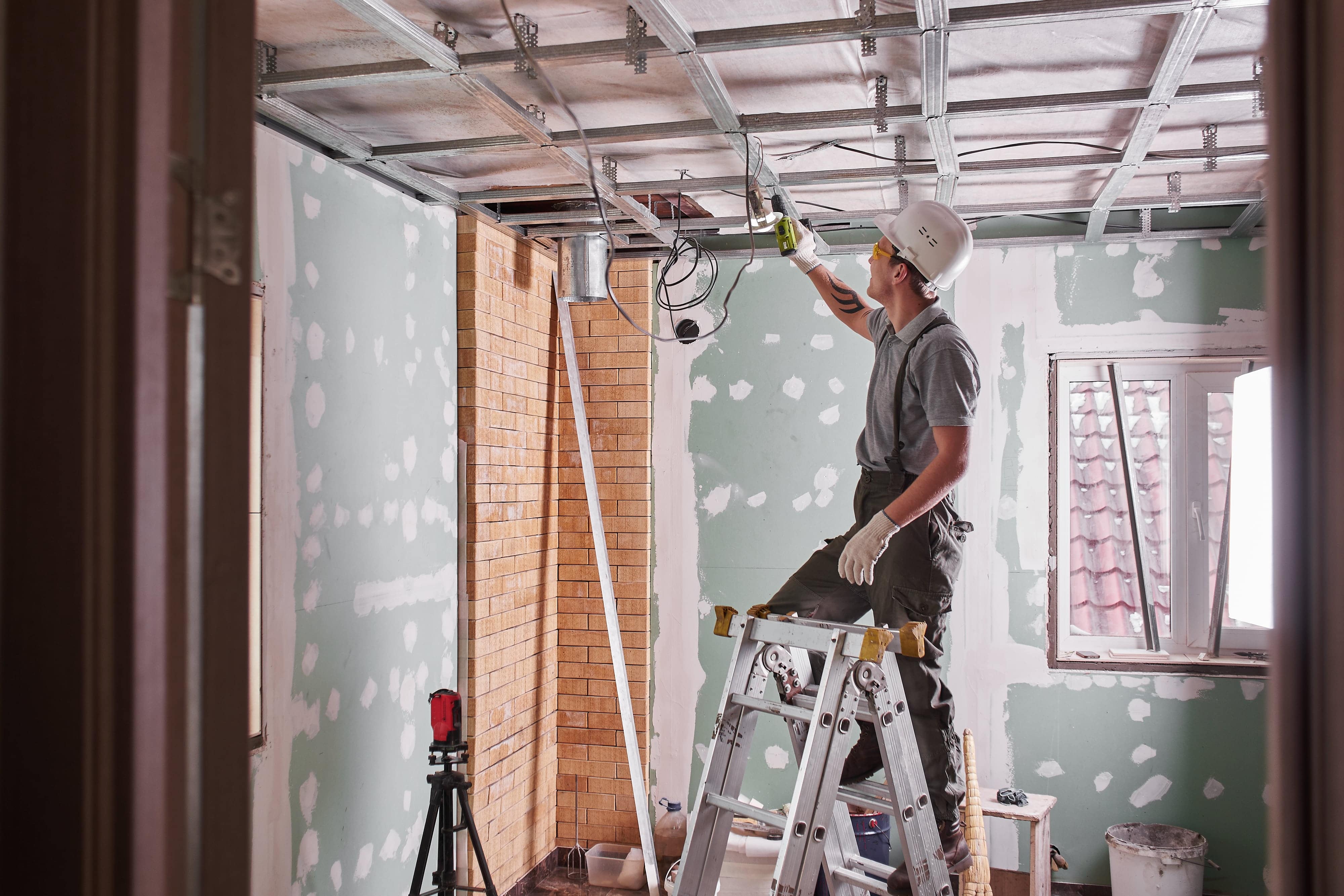 Construction worker on a ladder